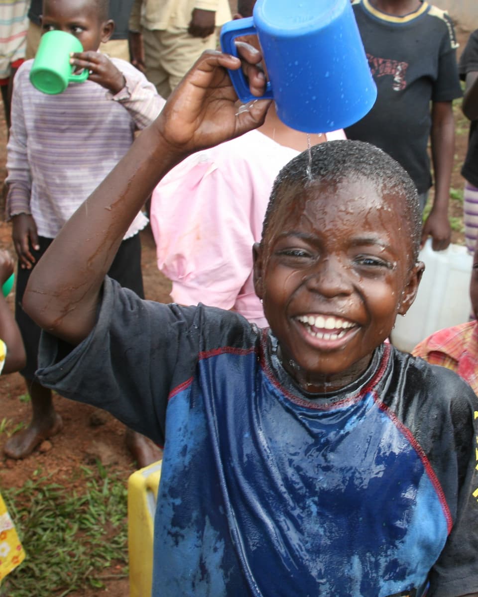 Children at water well